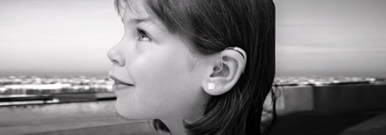 Child with hearing aids