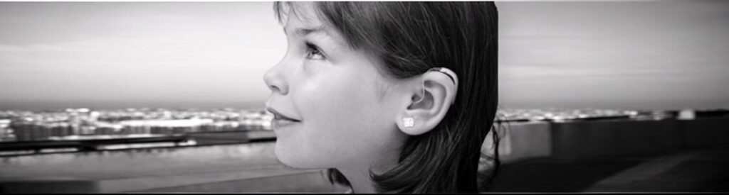 Child with hearing aids